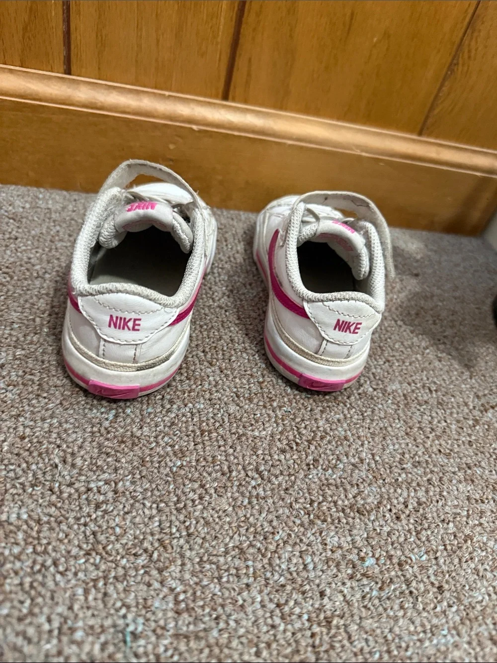 Nike Kids White Sneakers with Pink Swoosh